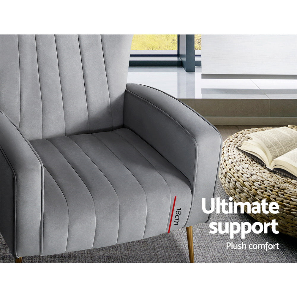 Grey velvet wingback armchair close-up of seat and armrest showing channel stitching and 18cm cushion depth callout