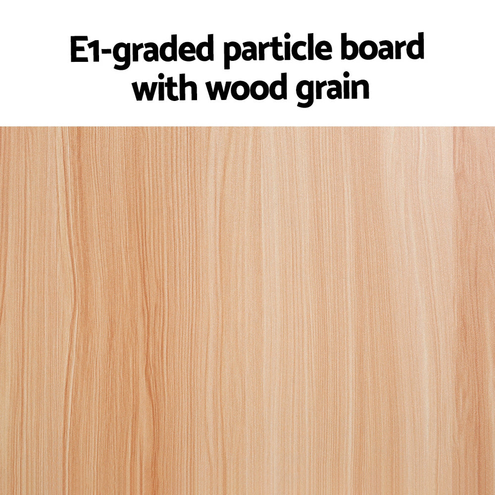 Close-up of light oak wood grain surface with text: E1-graded particle board with wood grain