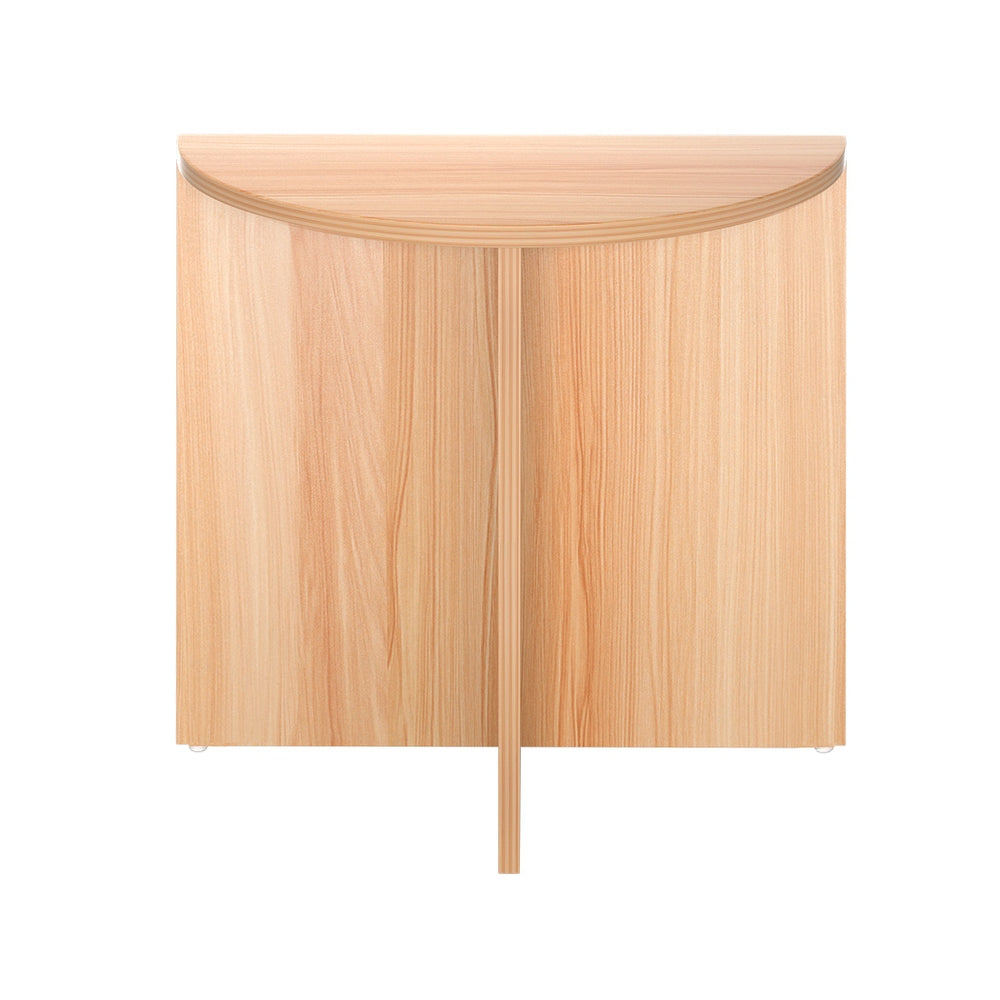 Rear view of half-moon side table showing flat back panel and cross-shaped base, natural oak grain, white background