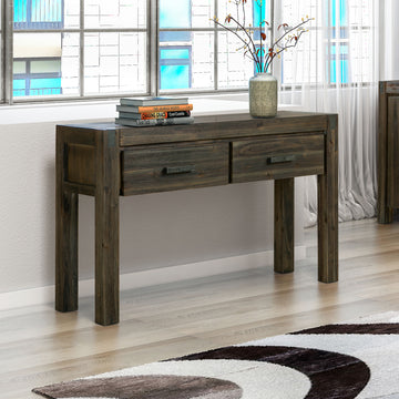 Dark charcoal wood console hall table with two drawers, dark metal bar handles and square legs, styled near window