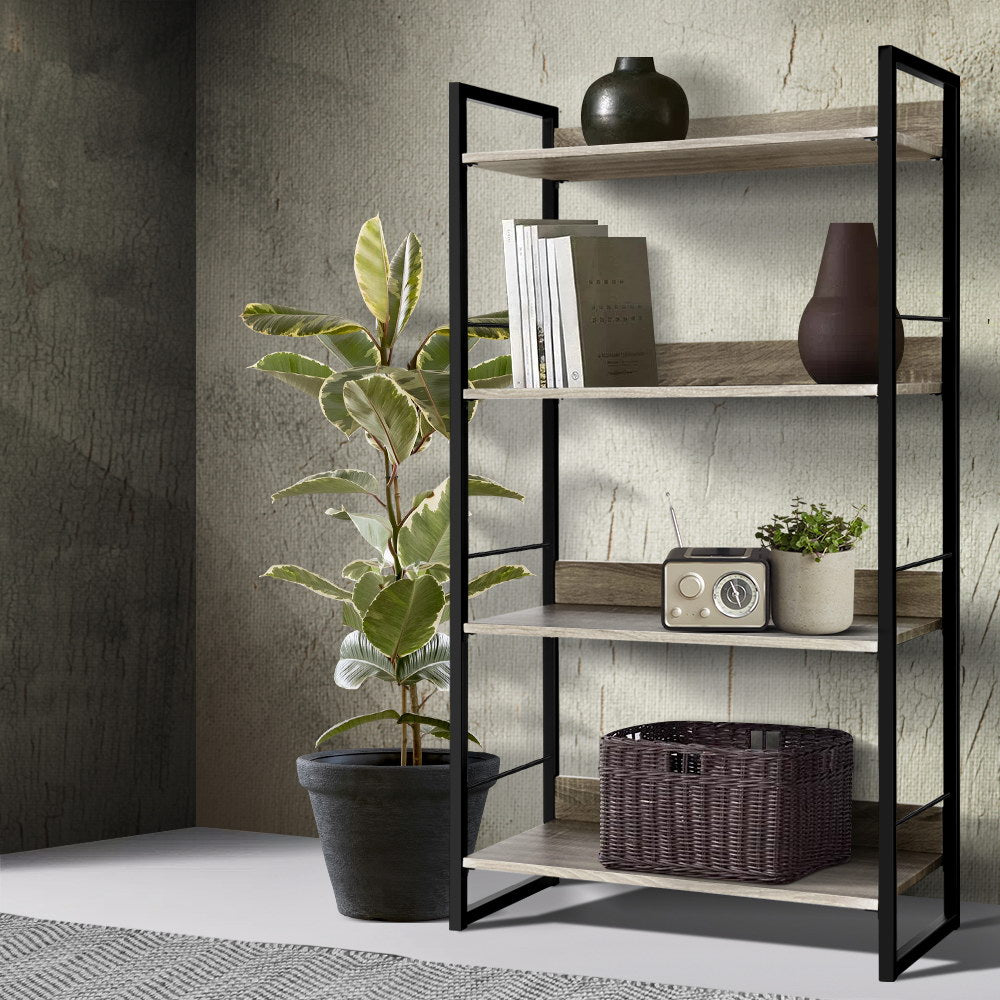 Industrial 4-tier open bookshelf with black metal frame and oak shelves styled with plant, books and wicker basket