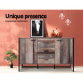 Industrial buffet with reclaimed wood finish in coral room, framed print and drinks tray on top; text: unique presence