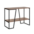 Industrial console table three-quarter: dark walnut top and lower shelf with black metal A-frame legs on white background