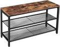 Industrial shoe bench with rustic brown wood top and two black wire mesh shelves on white background