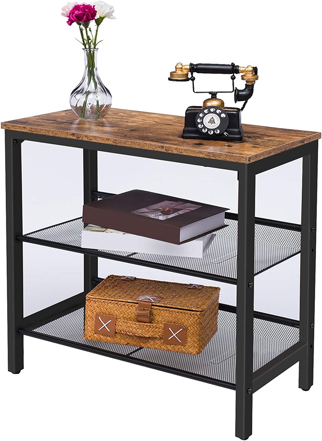 Industrial side table styled with vintage telephone and vase on top, books and rattan basket on mesh shelves