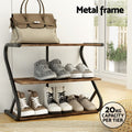 Industrial 3-tier shoe rack with bag on top rail and shoes on shelves, metal frame label and 20kg per tier badge