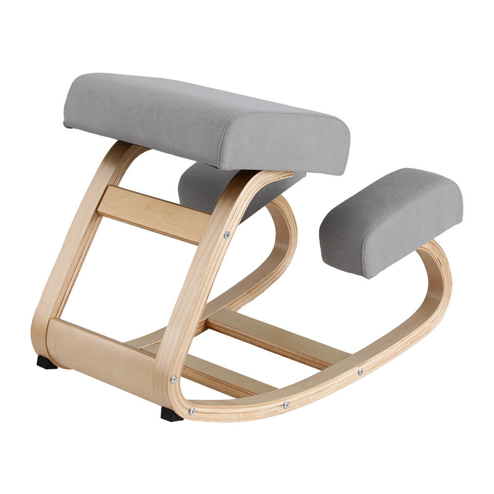 Grey fabric kneeling rocker chair side profile showing curved bentwood frame construction and single padded knee rest
