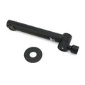 Matte black faucet components separated showing spout body and mounting assembly