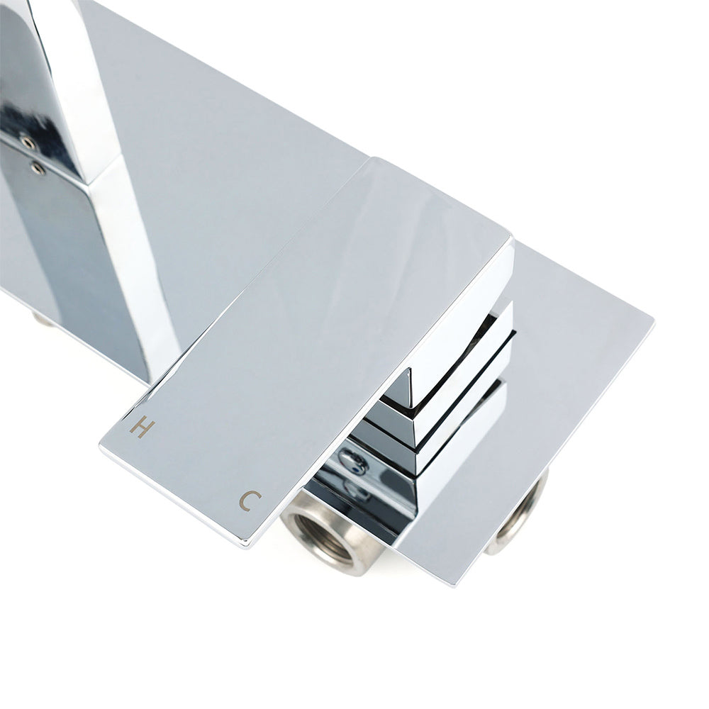 Close-up overhead of polished chrome valve assembly stacked control elements