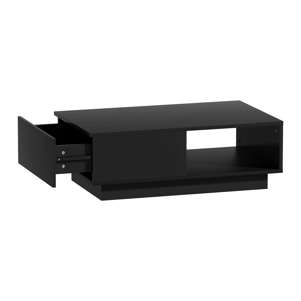 Matte black coffee table with left drawer fully extended showing metal runners and open right shelf