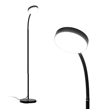 Black LED floor lamp with flexible gooseneck arm and round disc head, full view left, illuminated close-up right