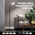 Black LED gooseneck floor lamp next to grey sofa in living room, text: 4 color temperatures 3000K-6000K, 4 brightness levels