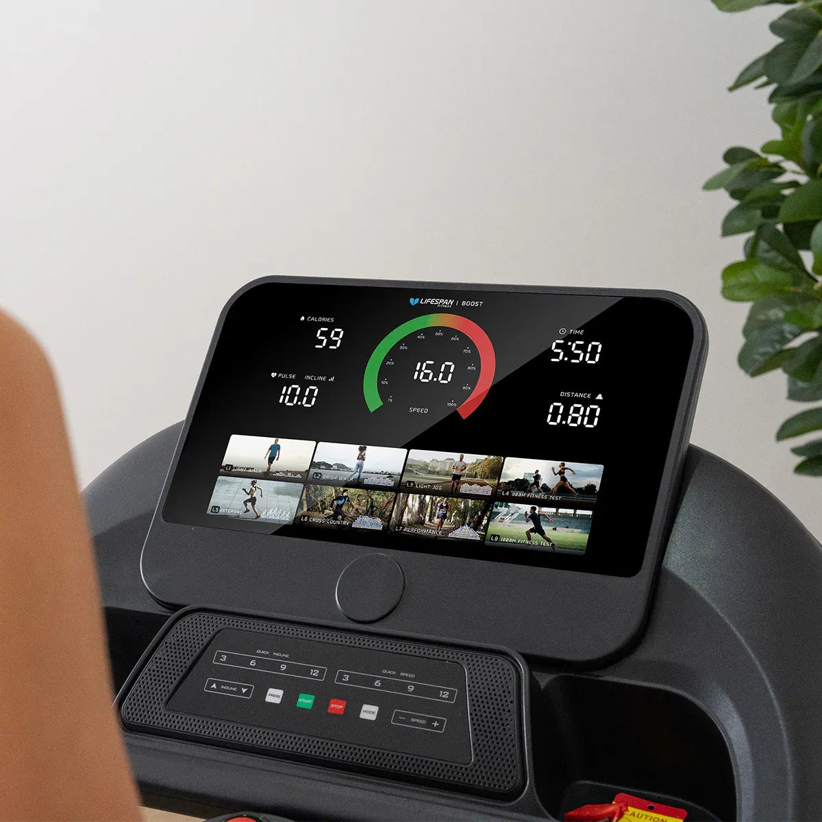 Boost 2 tablet showing virtual trail running routes with scenic locations