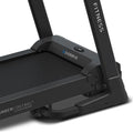 Woman using Focus C1 in home gym