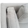 Light grey fabric 3-seater sofa close-up of backrest and arm junction from above showing seam detail