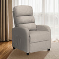 Light grey fabric recliner upright in living room with sheer curtains, wooden floor and rug, three-quarter angle