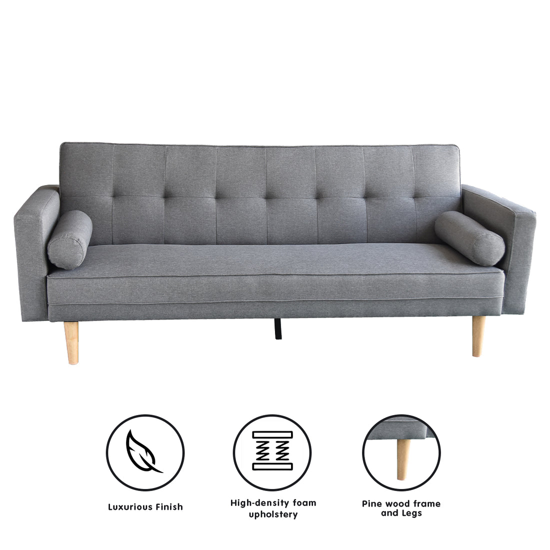 Light grey tufted linen sofa bed with cylindrical bolster cushions and tapered wooden legs on white background