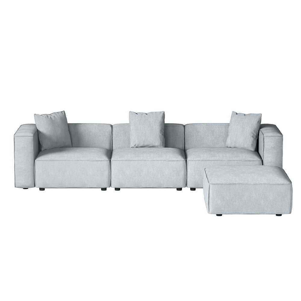 Light grey modular 3-seater sofa with right-side ottoman, front view on white background