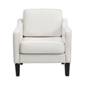 Beige linen armchair with piped edges, cushioned seat and black tapered legs, front view on white background