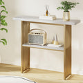 Marble console table with gold slat frame at angle, diffuser and plant on top, portable radio and decor on lower shelf