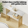 Faux marble console table with gold slat frame, lifestyle shot, overlay text: Modern faux marble tabletop with golden frame