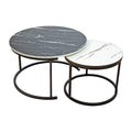 Two round nesting coffee tables separated: larger with black marble top and smaller with white marble top, bronze ring bases