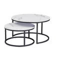 Two round nesting coffee tables with white marble-effect tops and black metal ring bases on white background