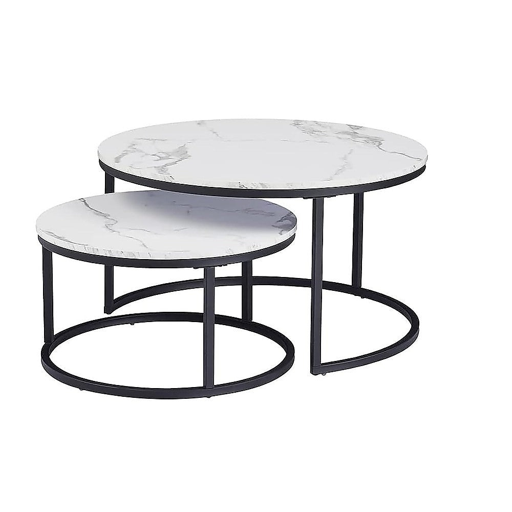 Two round nesting coffee tables with white marble-effect tops and black metal ring bases on white background