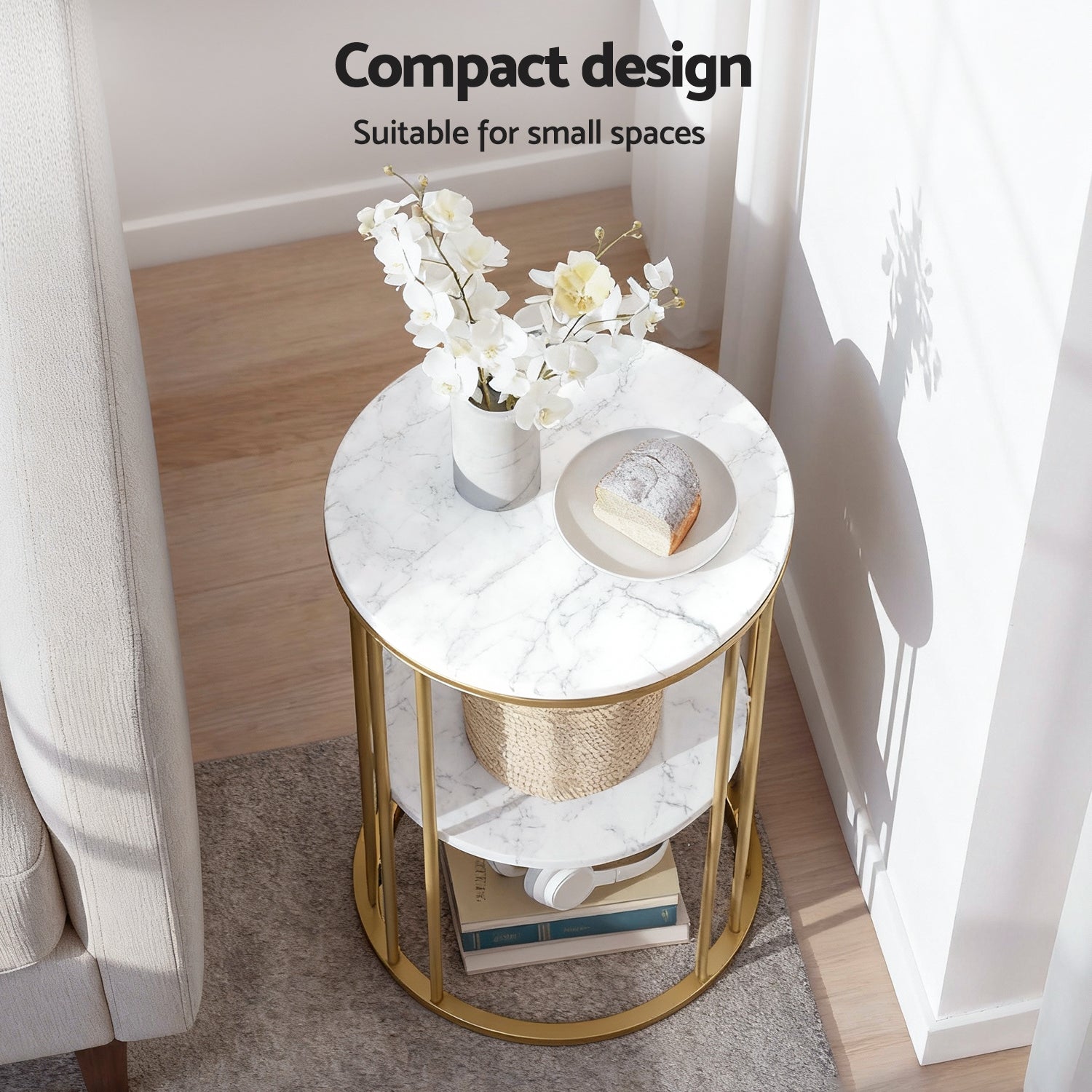 Overhead view of round two-tier gold frame end table, text: Compact design suitable for small spaces, orchid vase on top