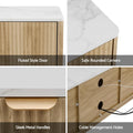 White marble-top TV unit details fluted style door safe rounded corners sleek metal handles and cable management holes