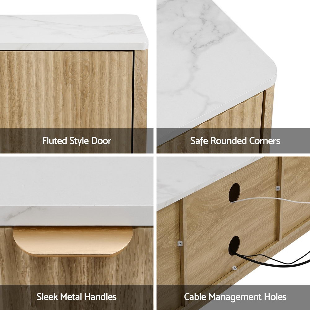 White marble-top TV unit details fluted style door safe rounded corners sleek metal handles and cable management holes