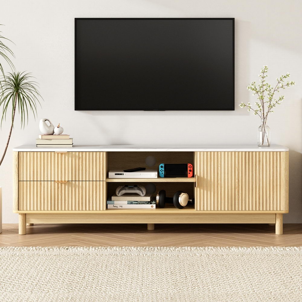 White marble-top TV unit with ribbed oak doors two open center shelves and round wood legs in white room