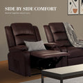 Two dark brown PU leather recliner chairs side by side, one with footrest extended and grey cushion, one with throw blanket