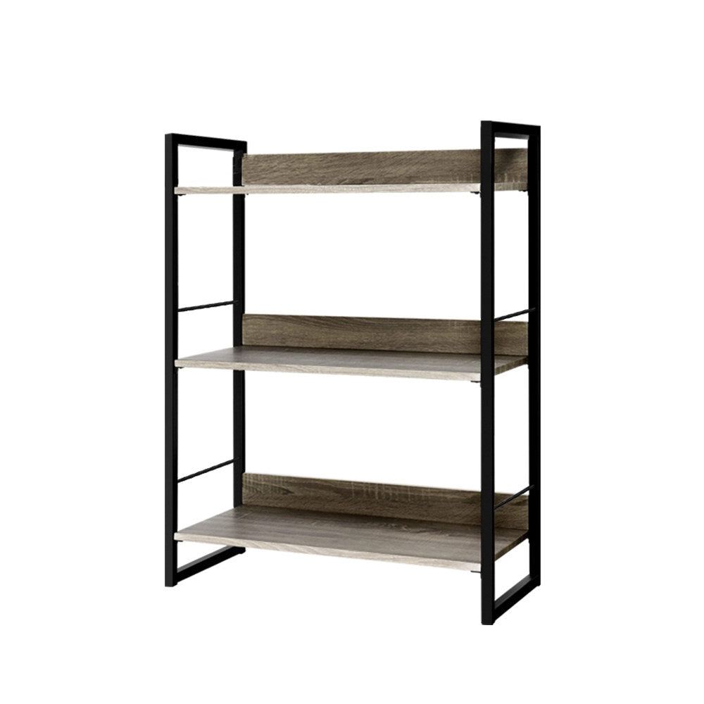 3-shelf open bookcase with black metal frame and grey oak shelves on white background, angle view