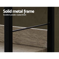 Close-up of black powder-coated metal frame and oak shelf; text reads Solid metal frame, excellent powder-coated finish