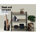 3-shelf metal frame bookcase in office setting with vintage phone and vases; text reads Sleek and compact, modern appeal