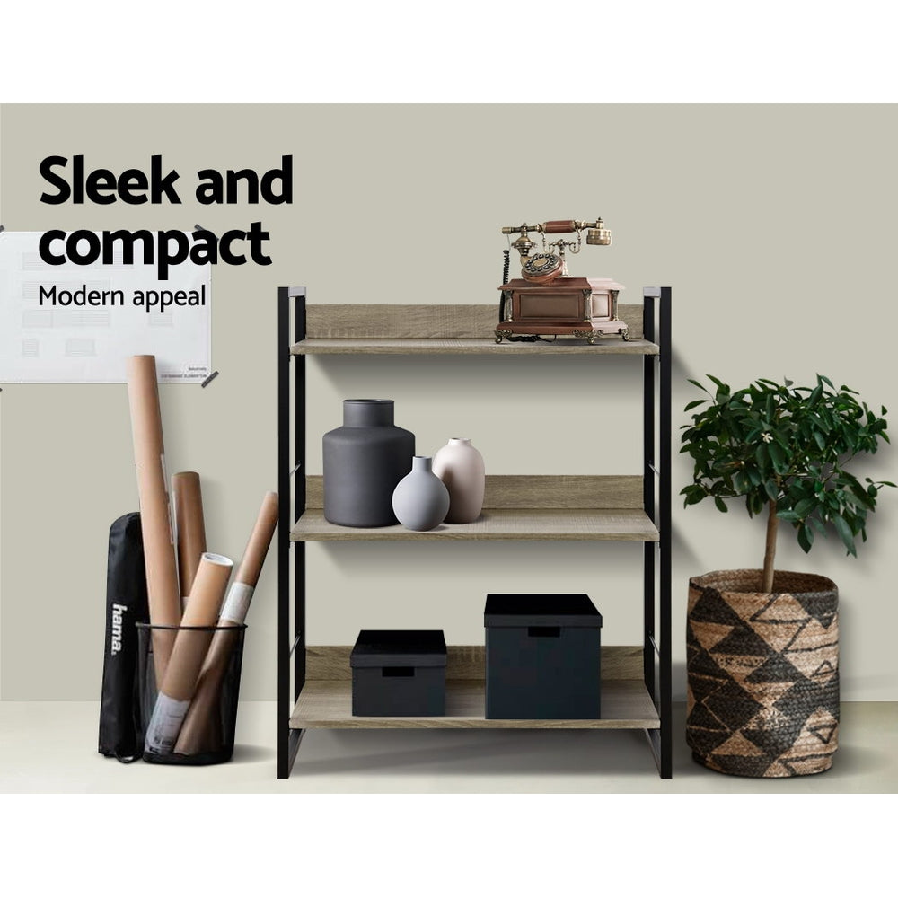 3-shelf metal frame bookcase in office setting with vintage phone and vases; text reads Sleek and compact, modern appeal