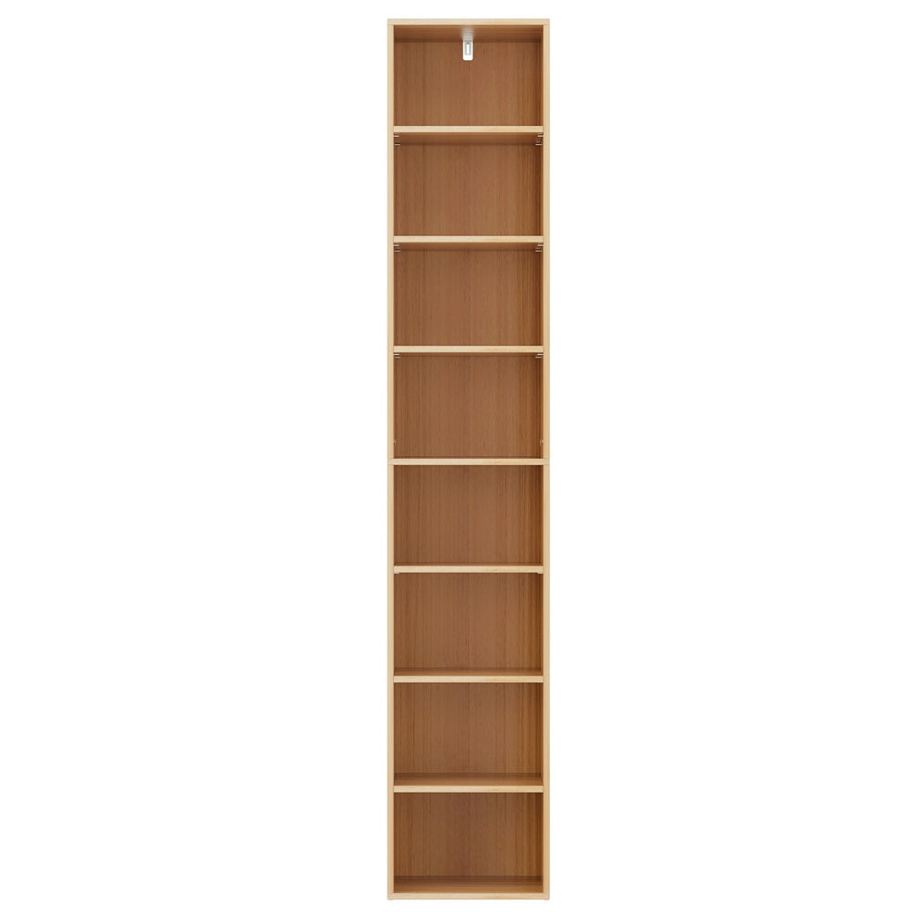 Narrow eight-tier column bookcase in light wood with walnut interior, empty, front view on white background