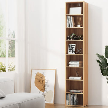 Narrow eight-tier column bookcase in light wood with walnut interior, styled with books and decor in a bright living room
