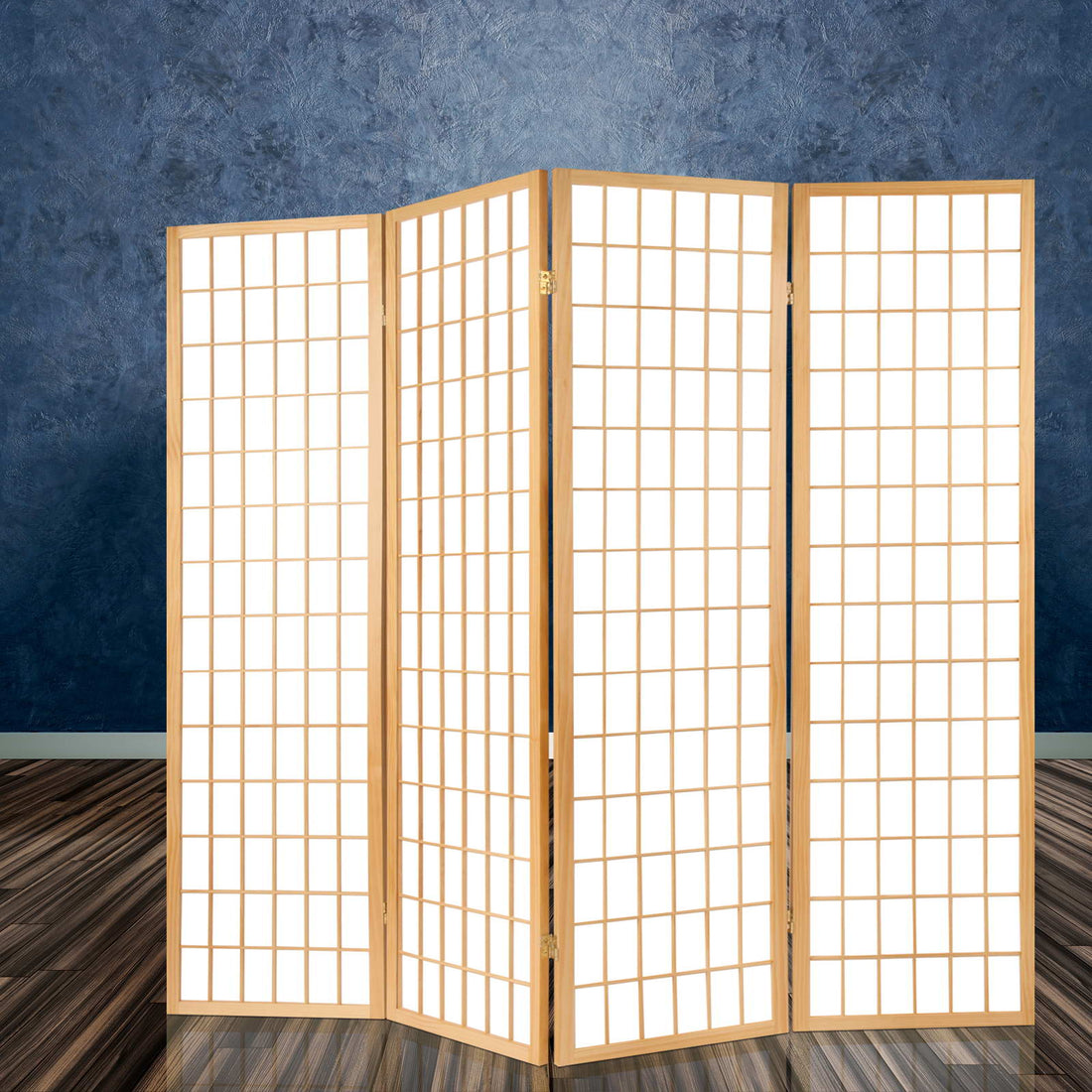 Natural pine 4-panel grid shoji room divider in room with dark stone textured wall and reflective floor