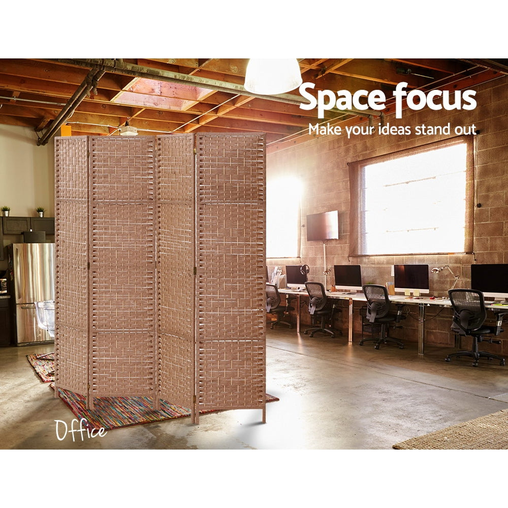 Natural 4-panel woven paper rope room divider in industrial office lifestyle with exposed ceiling beams and computer desks