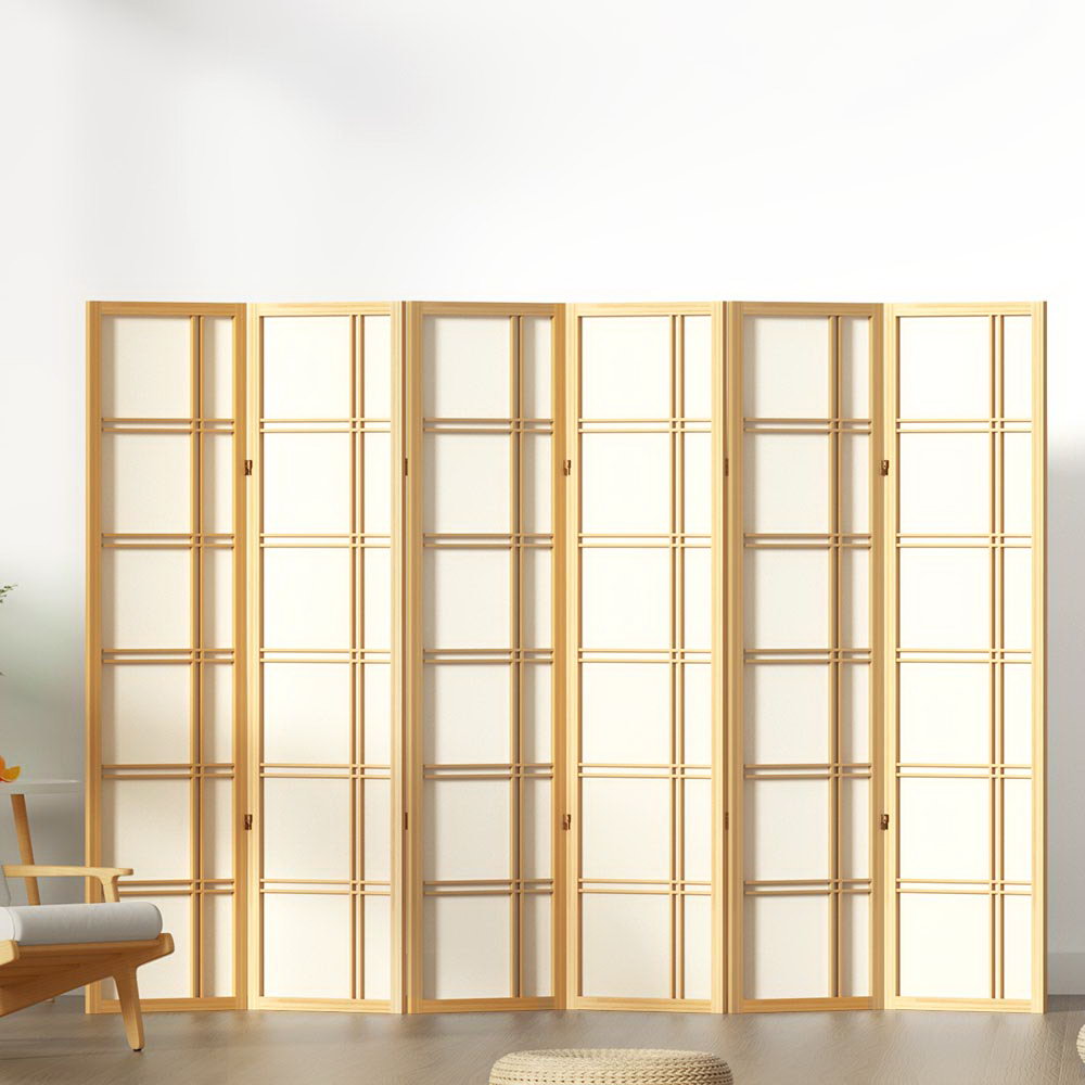 Natural pine 6-panel double crosshatch shoji room divider in lifestyle room with wooden chair and floor cushion