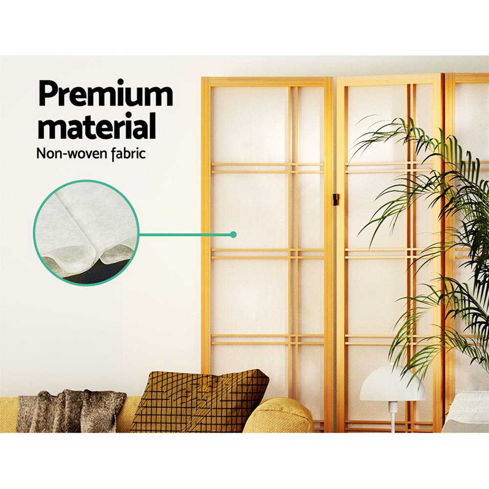 Natural pine crosshatch shoji room divider non-woven fabric close-up in lifestyle room with yellow sofa and palm plant