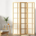 Natural pine wood 3-panel shoji screen room divider in Scandi lifestyle with fern plant orange bistro chair and round table