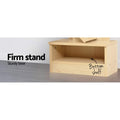 Natural wood tree bookshelf close-up of sturdy base with open bottom shelf, text Firm stand Sturdy base