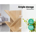 Close-up of natural wood tree-shaped bookshelf showing angled shelves; text highlights 7 tiers and 5kg capacity per tier