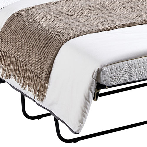Close-up of navy sofa bed pull-out showing black metal folding frame, white mattress edge and brown throw blanket