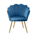 Navy blue velvet shell-back armchair with scalloped petal backrest and gold metal legs front view on white background