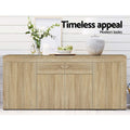 Oak buffet sideboard in room with flowers in vase, artichokes and lamp on top; text: timeless appeal, modern looks
