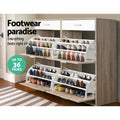 Oak 4-door flip-down shoe cabinet all doors open with shoes showing up to 36 pairs storage